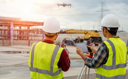 Asite_Blog_Key_Takeaways_Asite_BuildSmart_Webinar_Construction_Workers_Drone_tablet