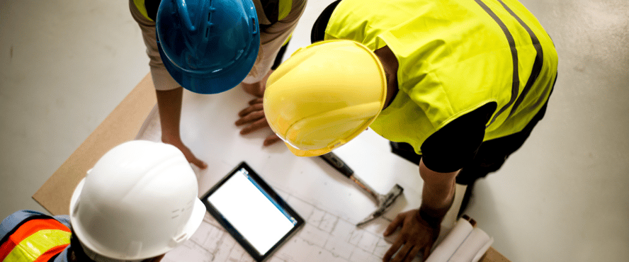 Asite_Blog_Survey_Says_Rising_Costs_&_Skills_Shortage_Rank_as_Major_Construction_Hurdles_tablet_construction_men