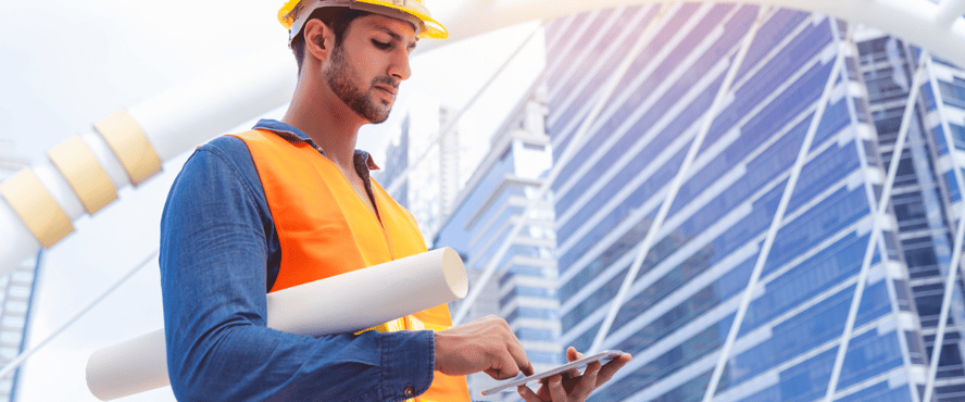 Asite_Blog_The_Background_Benefits_Outlook_of_BIM_in_the_Middle_East_mobile_phone_worker